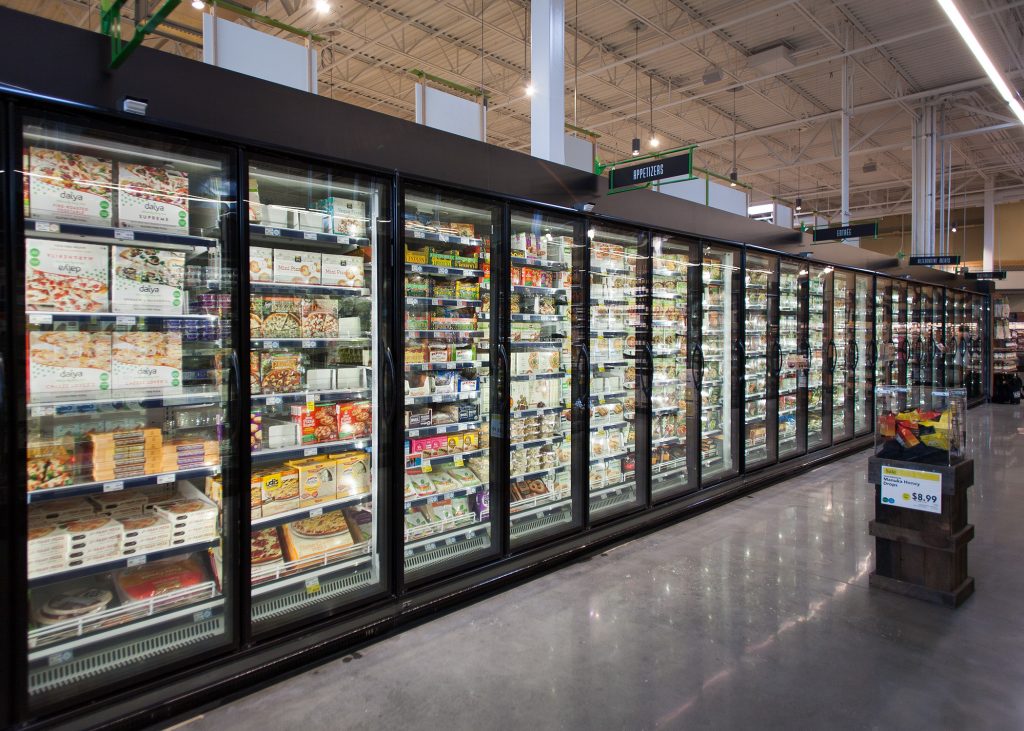 Supermarket frozen-food aisle with clear, condensation-free glass doors